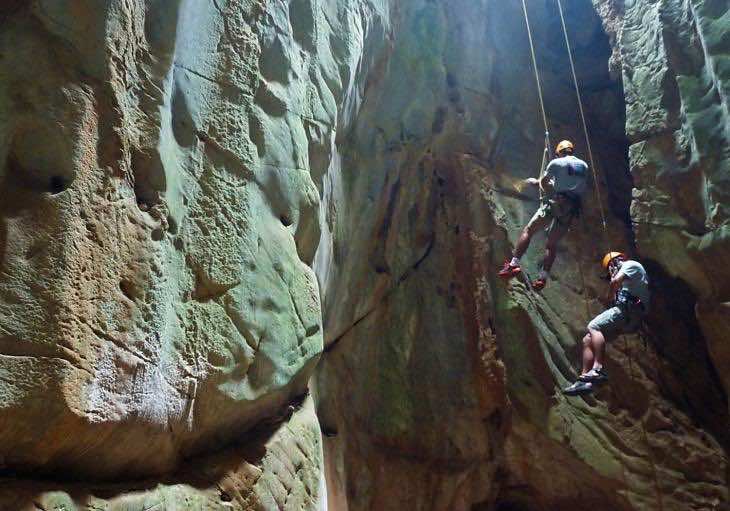 PrimaryImageAbseilingdownthecave 5dc7f25c28 730x511 crop