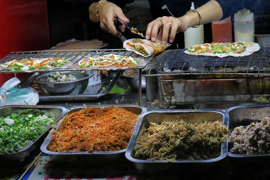 Trying the local cuisine is a must when traveling to Vietnam and Cambodia 1